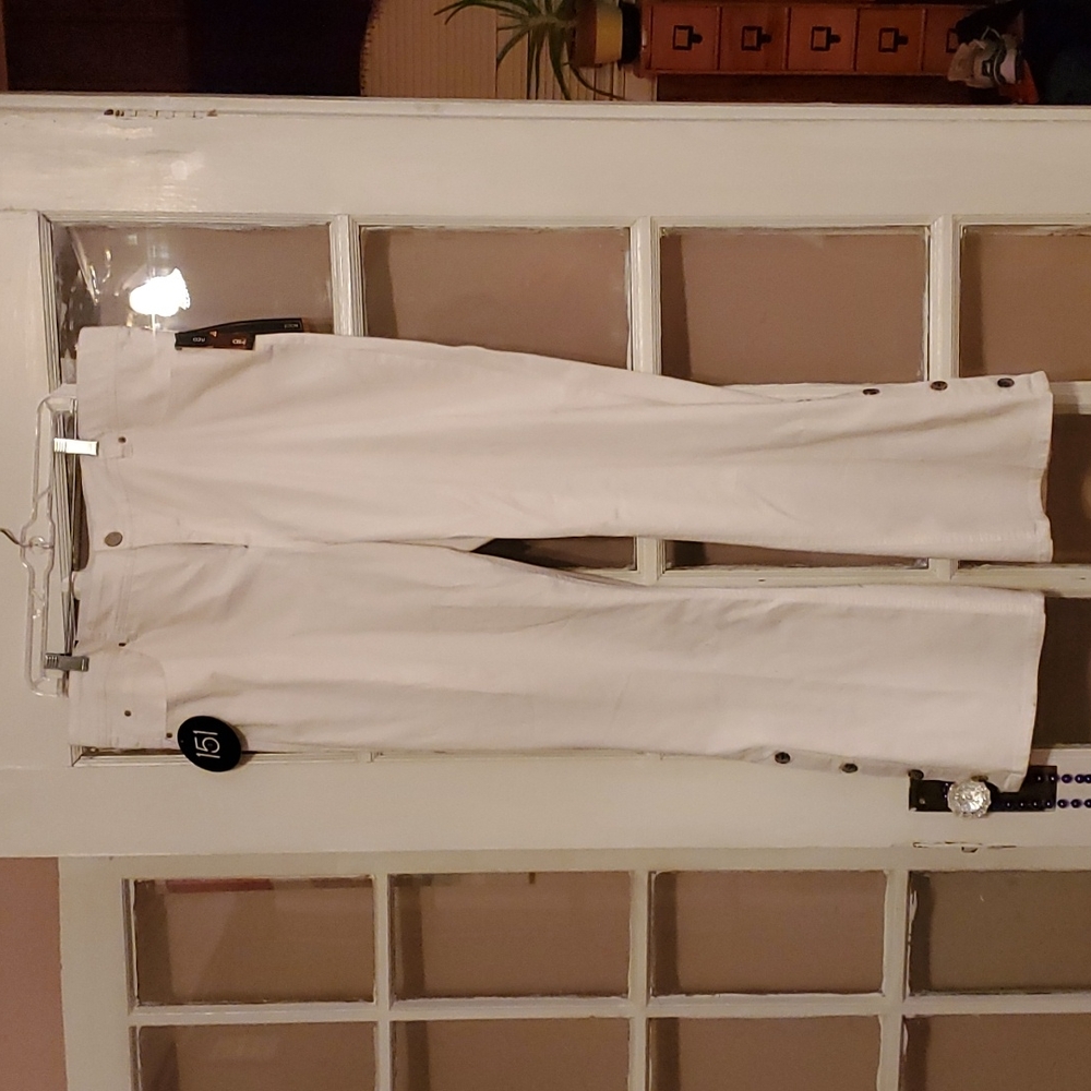 Plus sized white boot leg jeans
